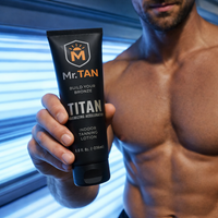 Man Holding Titan Tanning Accelerator Lotion
